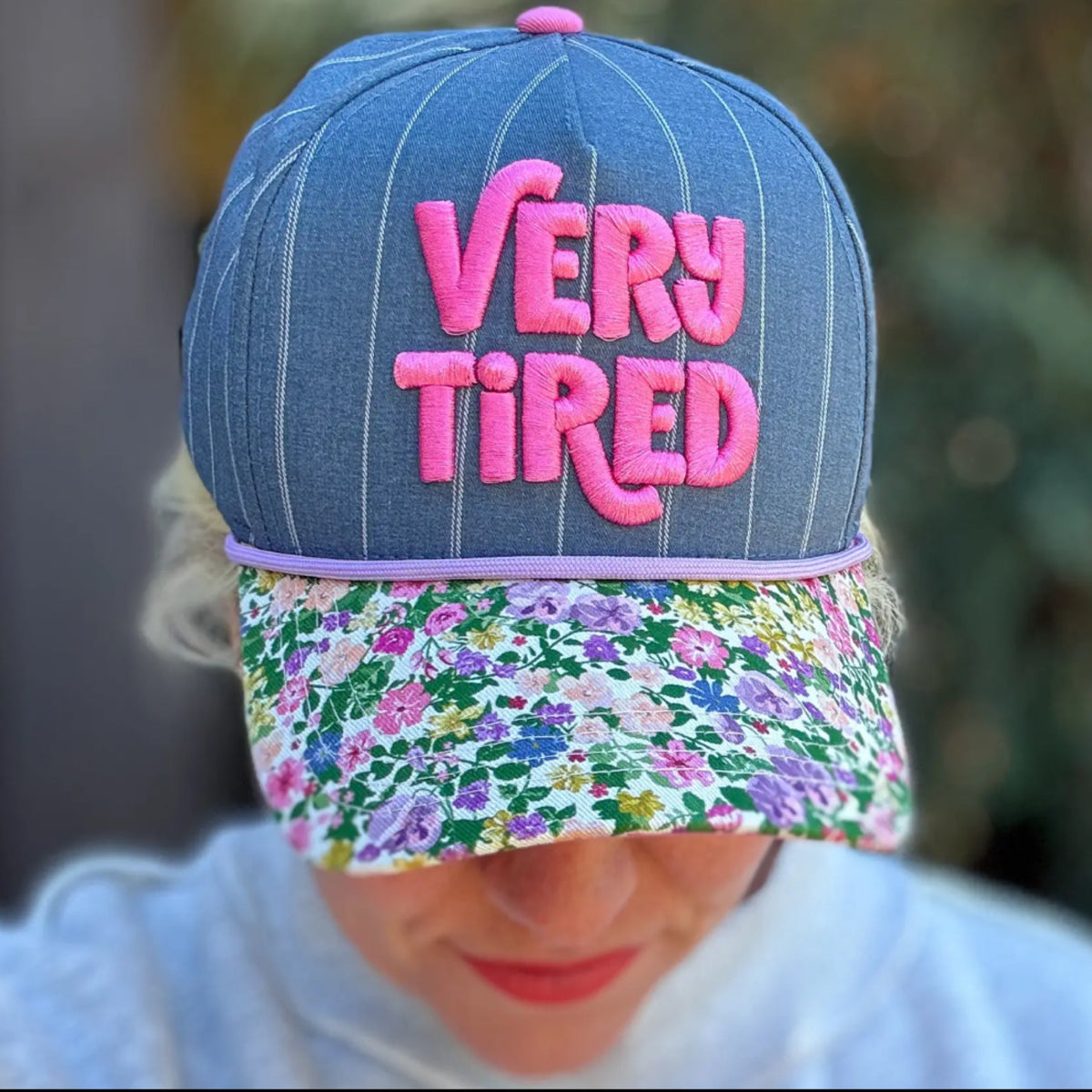 Embroidered baseball cap “very tired” blue chambray